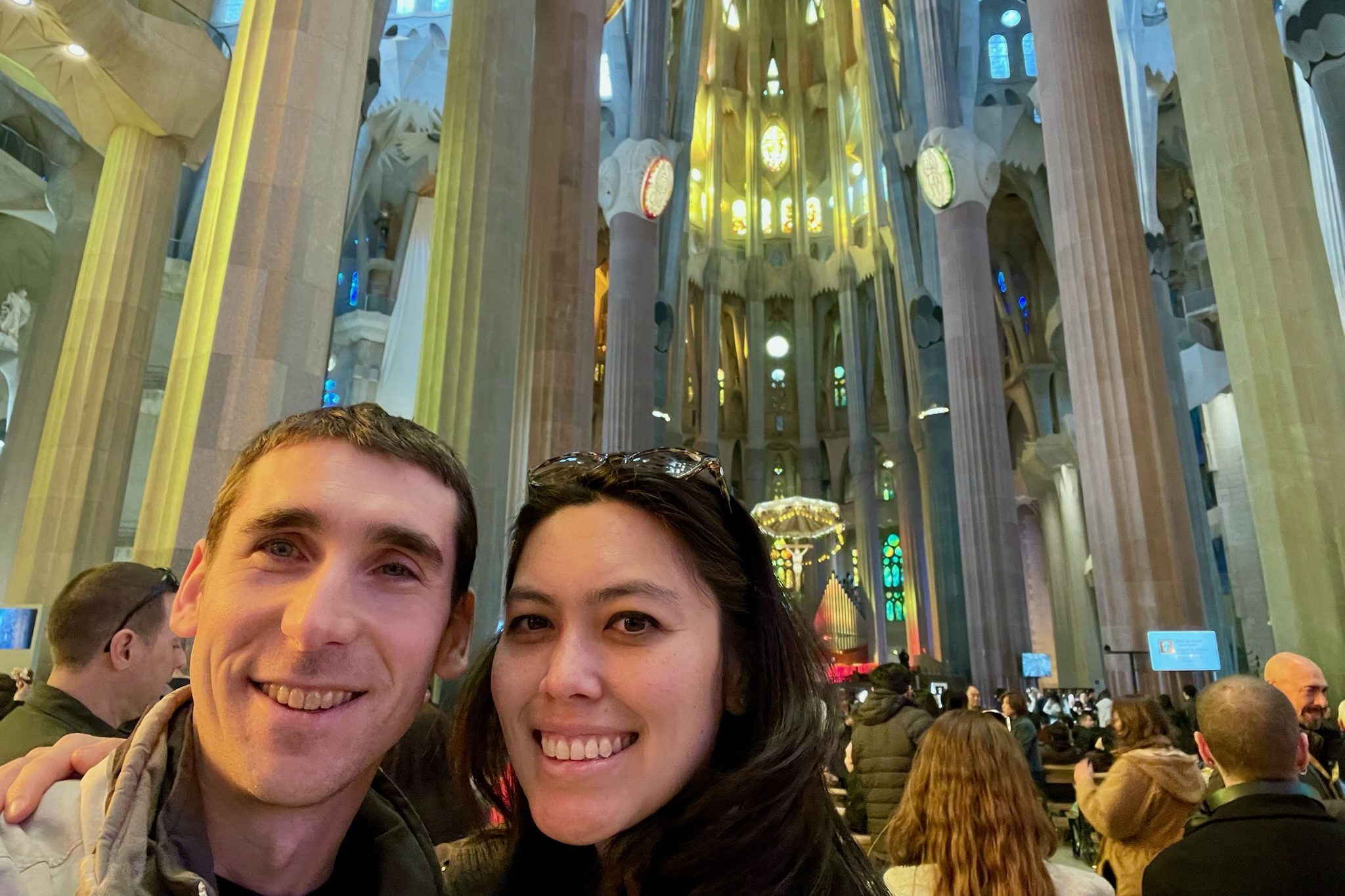 Travelers inside the Sagrada Familia in Barcelona, Spain
